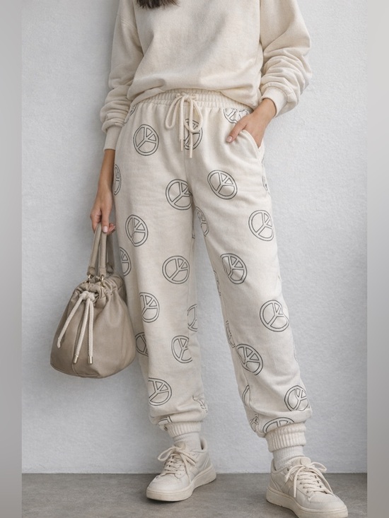 Brunette The Label Pants - BRUNETTE THE LABEL ALL OVER PEACE SIGN JOGGERS
